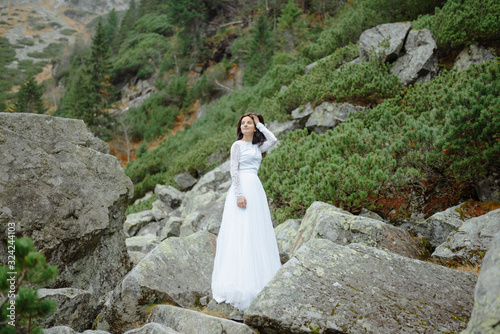 Bride near the Sea-eye lake in Poland
