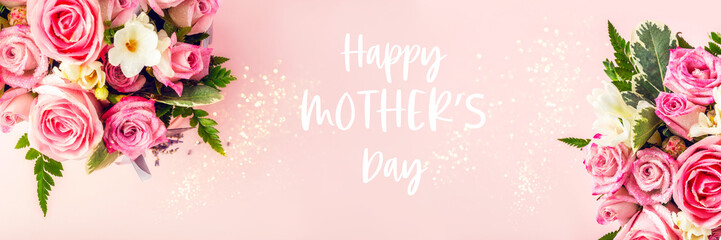 Happy Mothers Day words. Beautiful and tender bouquet of flowers in the hat box, nice present concept, banner size