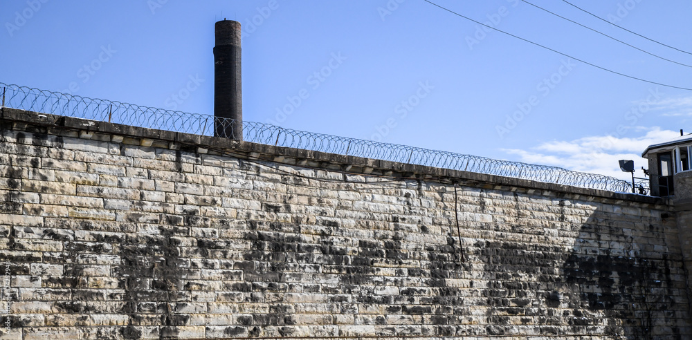 Fototapeta premium Abandoned and historic prison wall