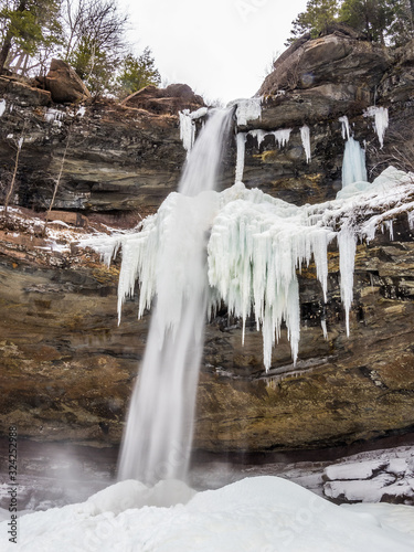 Frozen Kaaterskill Falls in winter Catskill mountains photo