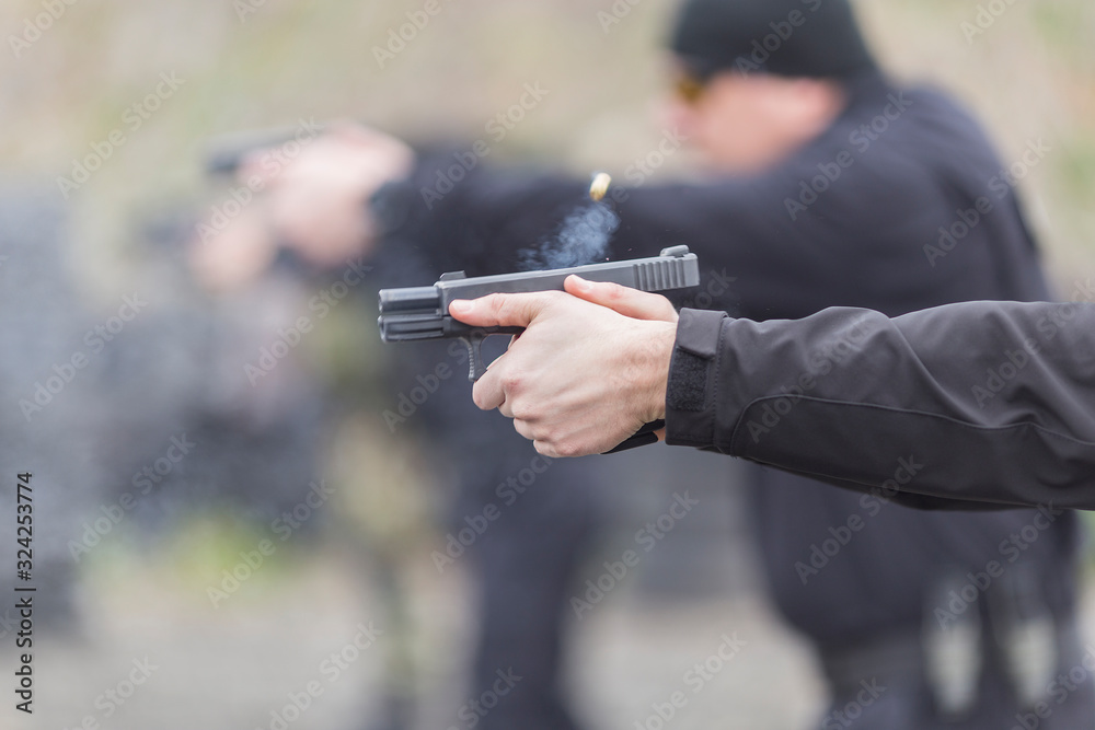 police, army and border police gun training. firing weapons and pistols. gun  shooting exercise. detailed shots of gun, bullets and shells. Stock Photo