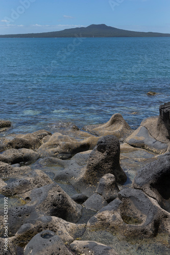 Auckland Takapuna New Zealand Rocky coast Rangitoto island volcano