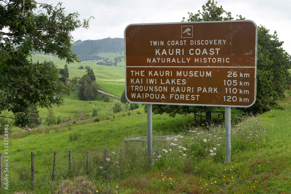 Roadsign Kauri coast New Zealand. Twin coast discovery. Kauri Museum. Kai Iwi Lakes. Trounson Kauri Park. Waipoua Forest.