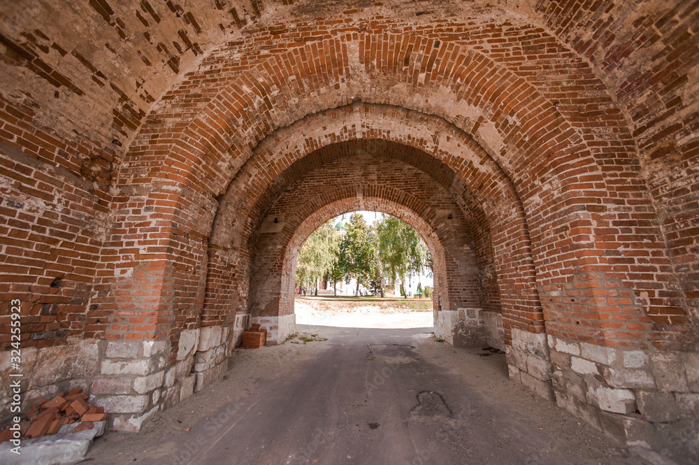 The red brick wall of the old Kremlin military fortress in the city of Zaraysk