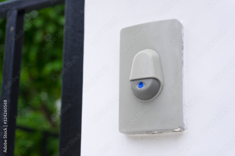 Doorbell or buzzer on mounted on wall detail Doorbell or buzzer on mounted on wall detail