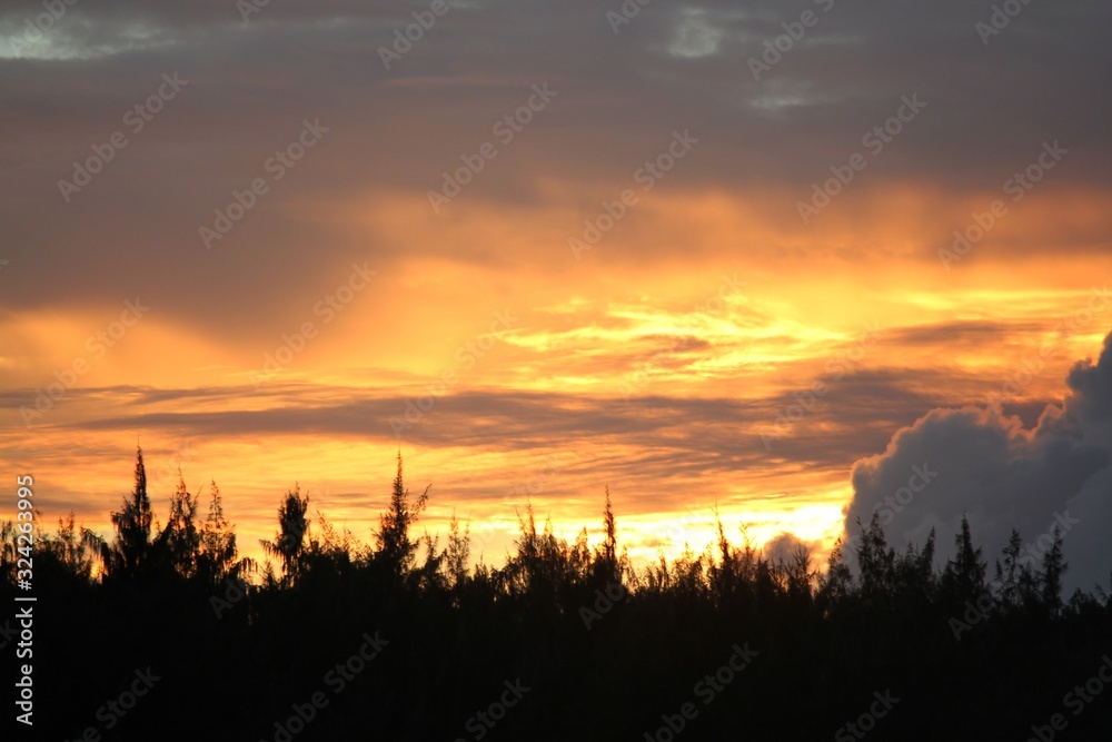 Flaming skies with dramatic cloud formations at sunset Flaming skies with dramatic cloud formations at sunset