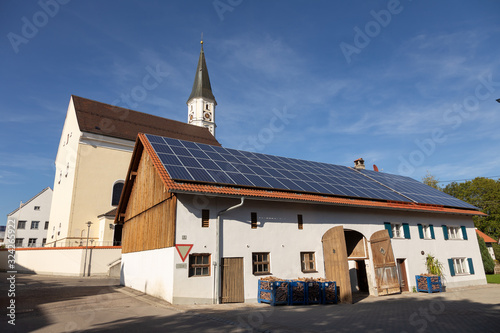 Farm with solar panels in a small village in Bavaria, Germany
