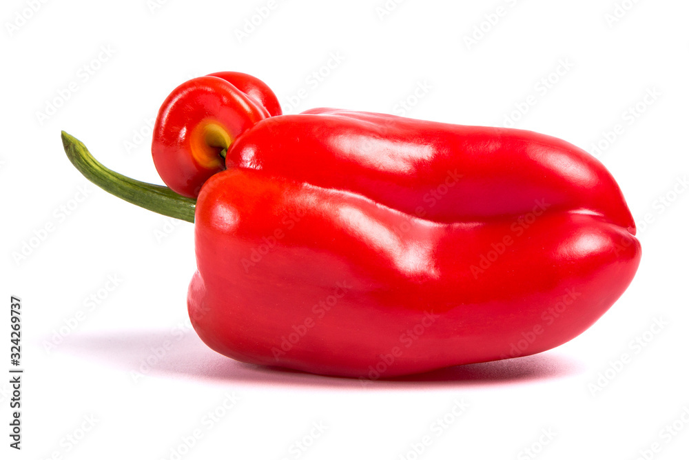 Ugly shaped organic vegetables. Deformed homegrown bell pepper isolated on white background