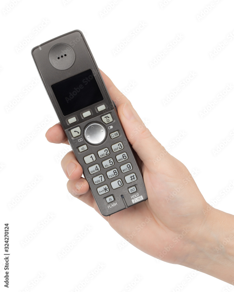 Female hand holds a phone with a blank screen, isolated on white background Female hand holds a phone with a blank screen, isolated on white background