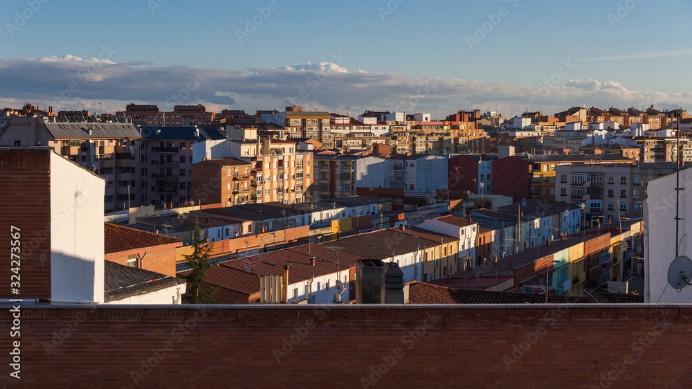 Panoramic view from roof of buildings and rooftops of a city neighborhood 