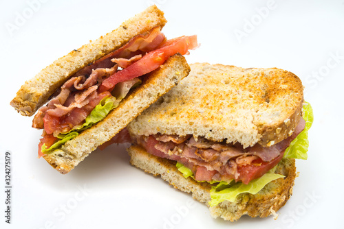 A BLT is a type of sandwich, named for the initials of its primary ingredients, bacon, lettuce and tomato photo