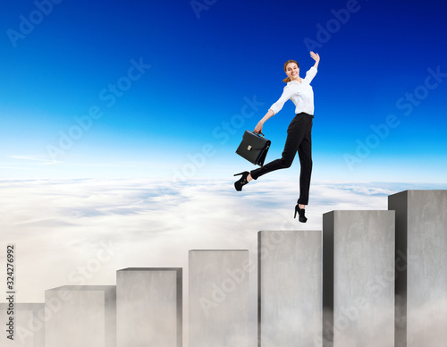 Business woman running on the concrete stairs blocks.