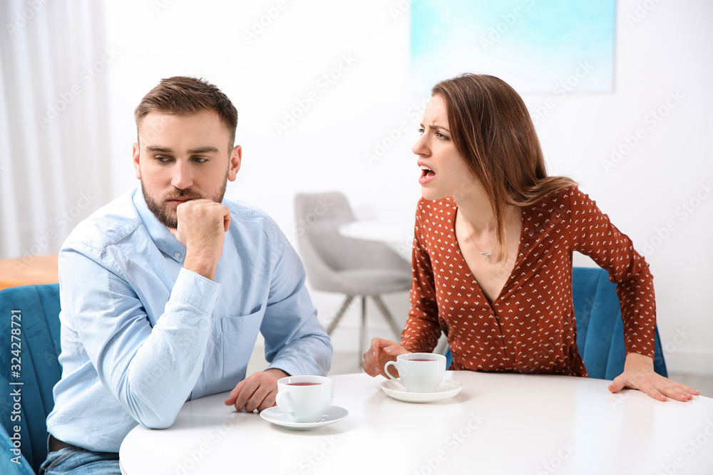 Couple having quarrel in cafe. Relationship problems Couple having quarrel in cafe. Relationship problems