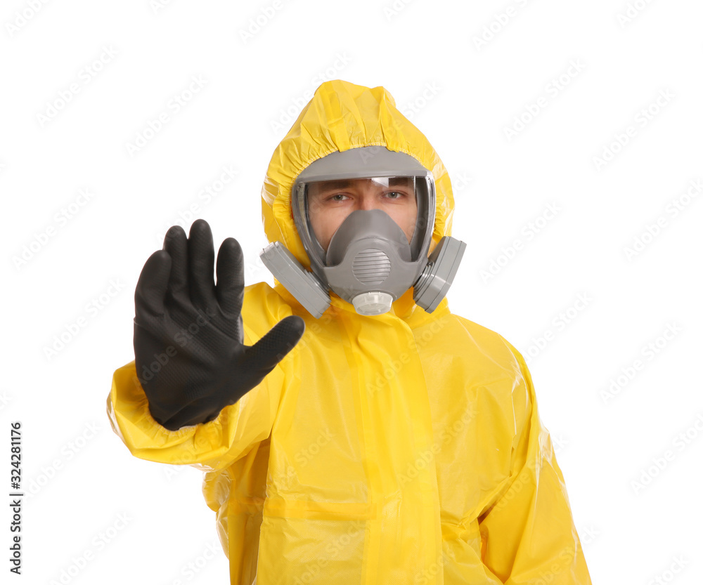 Man in chemical protective suit making stop gesture on white background. Virus research Man in chemical protective suit making stop gesture on white background. Virus research