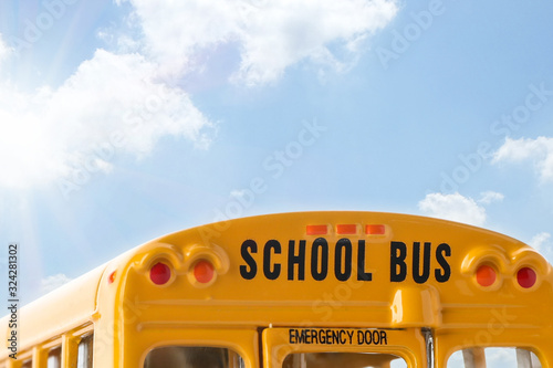 Yellow school bus outdoors, closeup. Transport for students