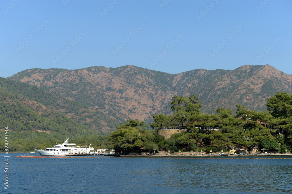 Beach on the shores of the Bay of Marmaris in the Aegean sea. Turkey