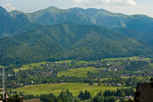 Region at the foot of the Tatra Mountains. Zakopane town in Poland. Panorama of high mountains. © Khrystyna Bohush