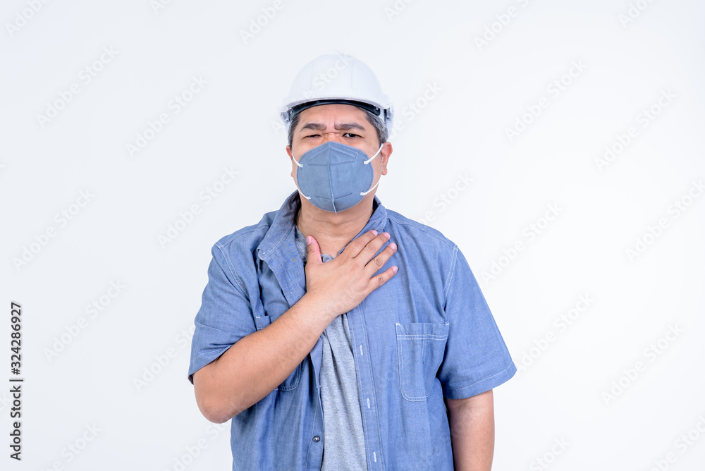 Asian engineer Wear a white helmet and wearing a mask to prevent germs On white background concept health care and Basic virus prevention such as COVID-19, PM 2.5 and flu Asian engineer Wear a white helmet and wearing a mask to prevent germs On white background concept health care and Basic virus prevention such as COVID-19, PM 2.5 and flu