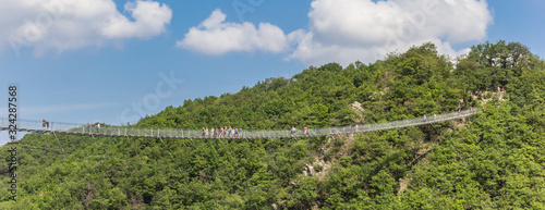 Panorama of the Geierlay suspension bridge in the mountains near Morsdorf, Germany