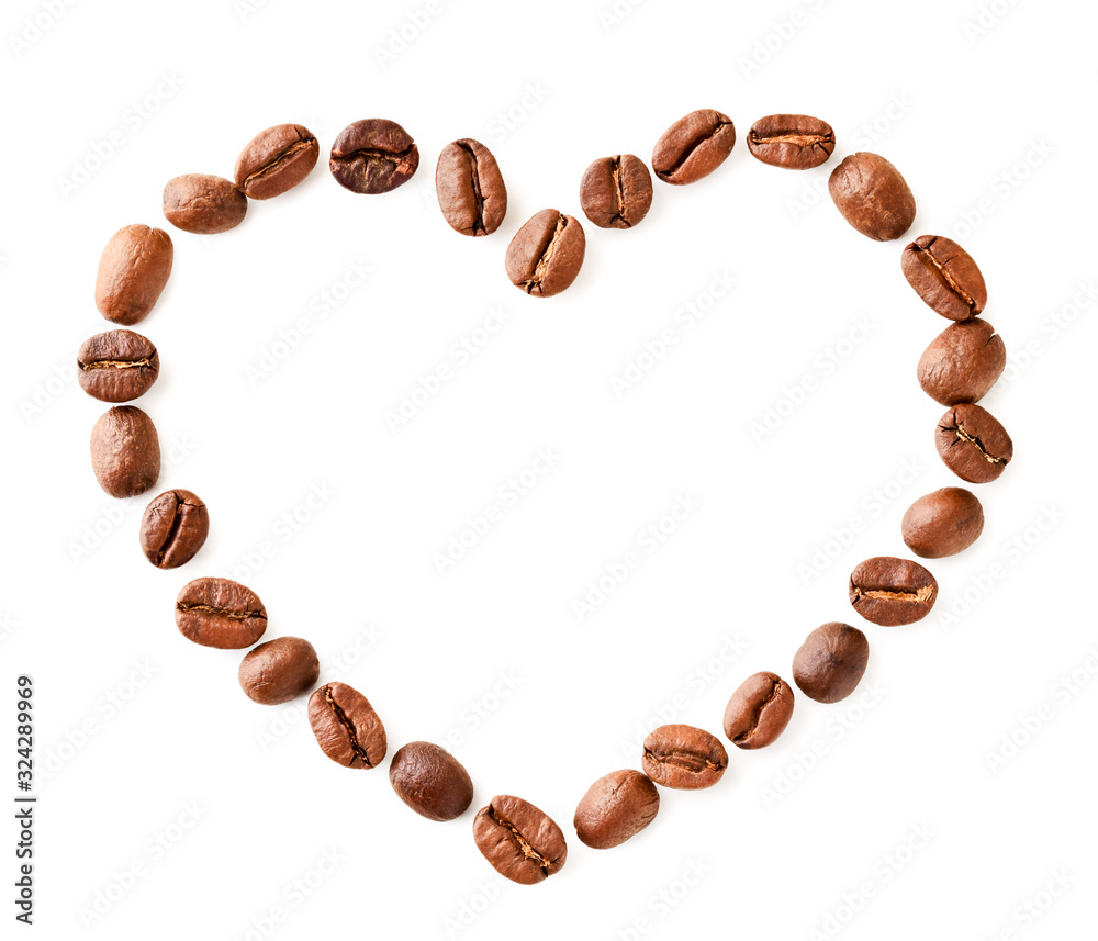 Coffee beans of the heart lie on a white, isolated. The view from the top Coffee beans of the heart lie on a white, isolated. The view from the top