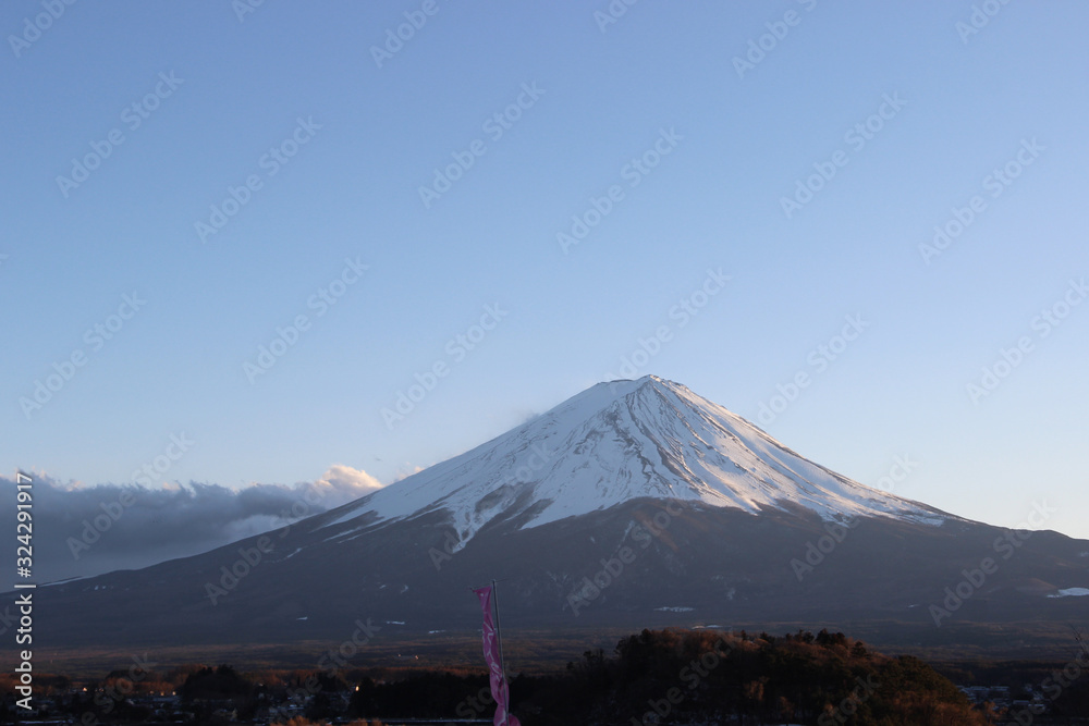 The view of Mount Fuji is the snow covered in the morning of winter.
