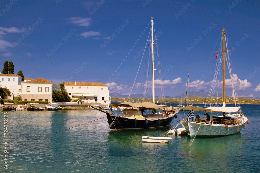 Boats in the old harbour of Spetses island in Saronic gulf, Greece