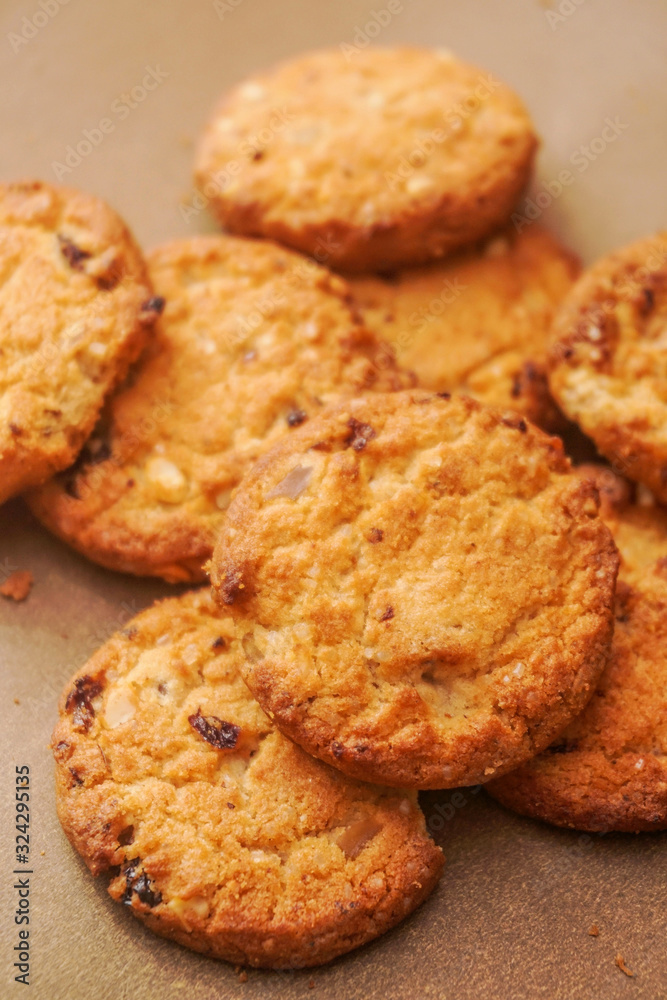 Freshly baked cookies with raisins and cashew nuts