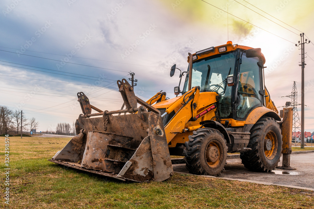 Excavator loader in a parking lot for road transport Excavator loader in a parking lot for road transport