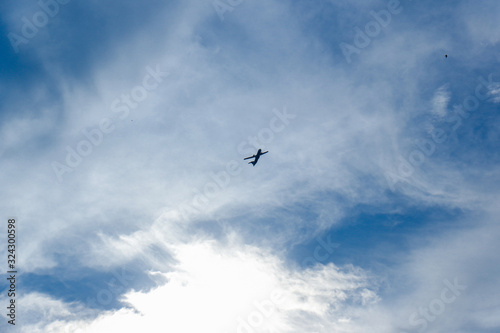 silhouette of air plane on the sky