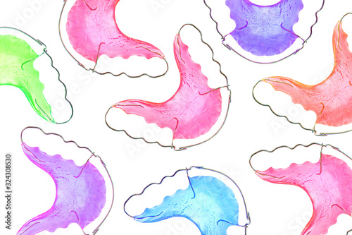 dental braces or retainers for teeth on background, close up