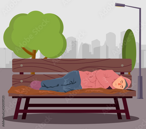 Homeless person sleeping on a bench