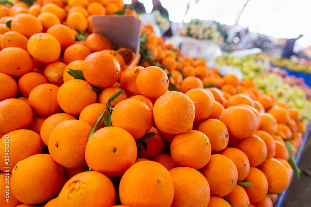 Delicious oranges lies on a turkish market
