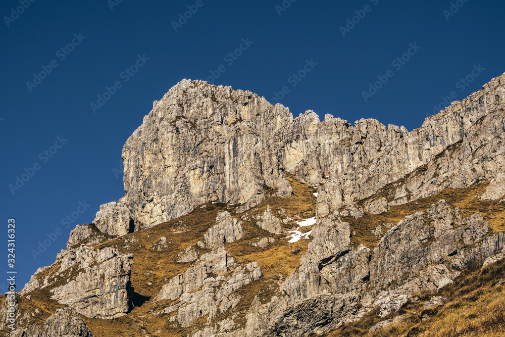 Nature and landscape during the late afternoon seen from the Lombard Mountains above the city of Lecco, Italy - February 2019.