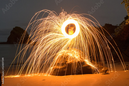 Steel wool photography in the beach