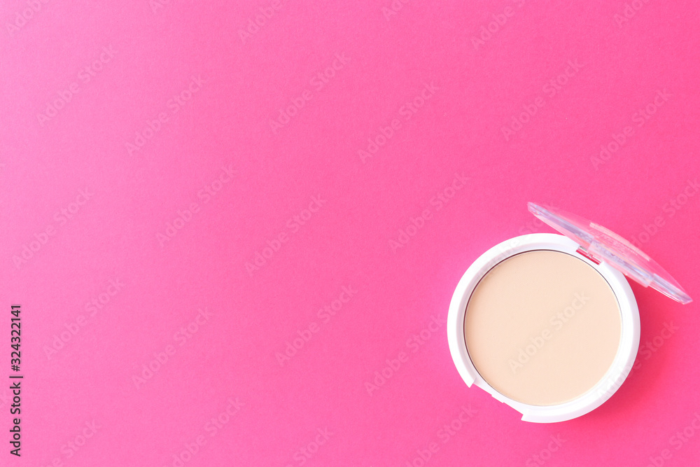 Beige powder for make-up, pink. Beautiful beige powder for make-up on a pink flat lay. Concept for your design. Spring background. Beige powder for make-up, pink. Beautiful beige powder for make-up on a pink flat lay. Concept for your design. Spring background.