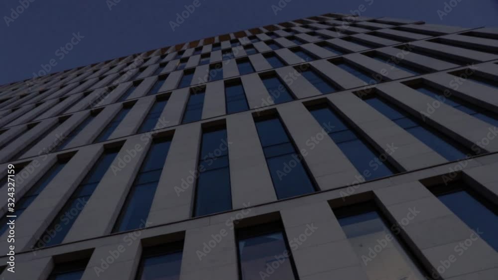 building underneath with long dark windows building underneath with long dark windows