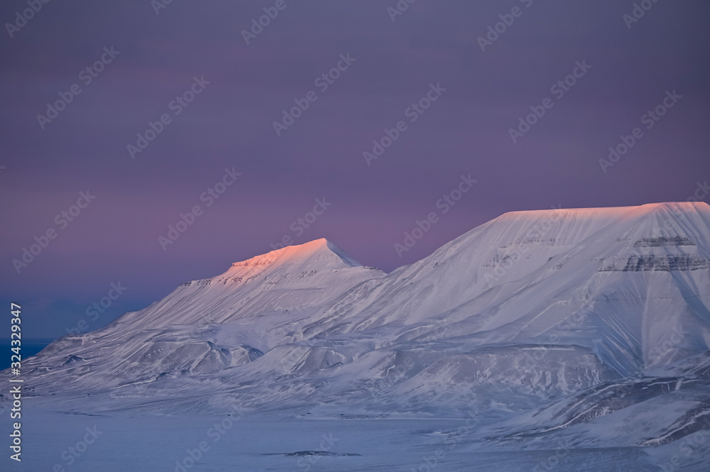 Naklejka premium norway landscape nature of the mountains of Spitsbergen Longyearbyen Svalbard arctic ocean winter polar day sunset sky
