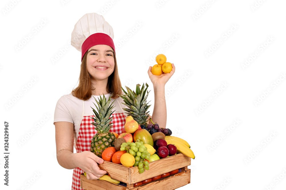female cook with lemons and other fruit in wooden crate female cook with lemons and other fruit in wooden crate