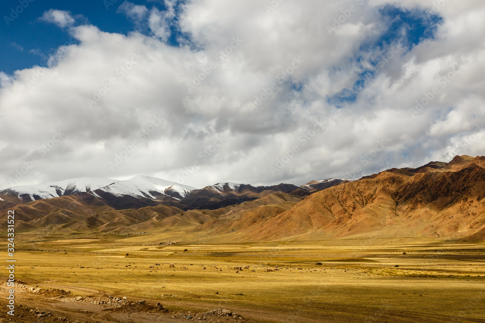 A 367 highway, passing in the Naryn region, Kyrgyzstan, Mountain landscape near the village of Uzunbulak Kochkor District