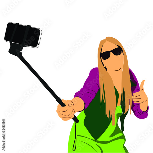 Girl take a self portrait with her smart phone, taking selfie - hand hold monopod with photo camera.