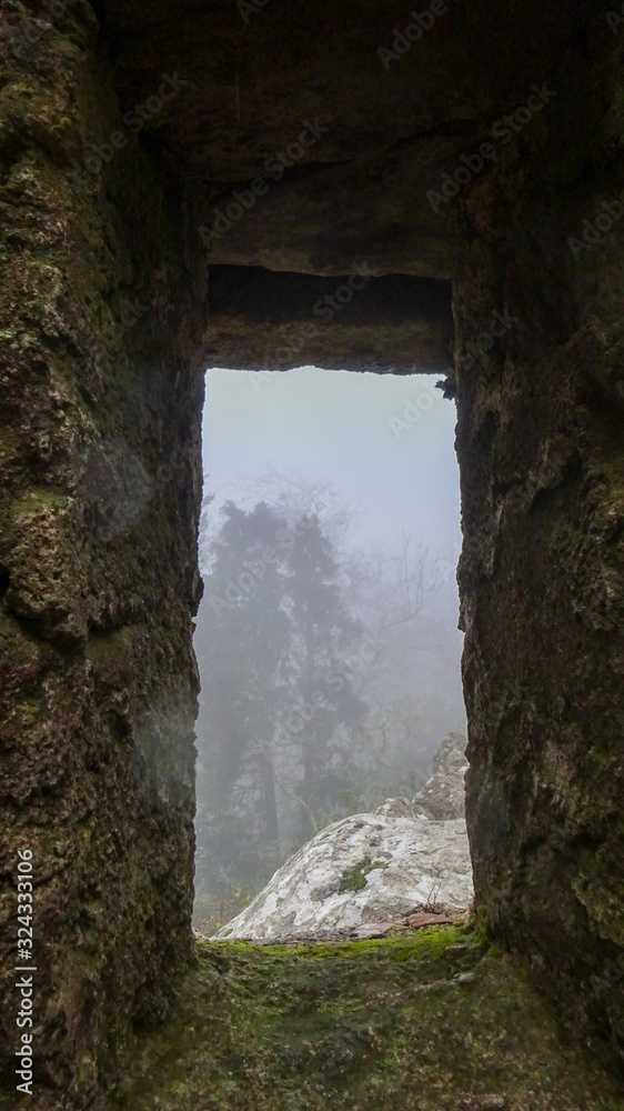 window in stone wall