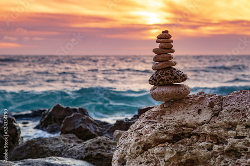 Zen concept. The object of the stones on the beach at sunset. Harmony & Meditation. Zen stones. Relax.