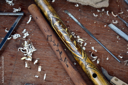 Carving an elder stick whistle