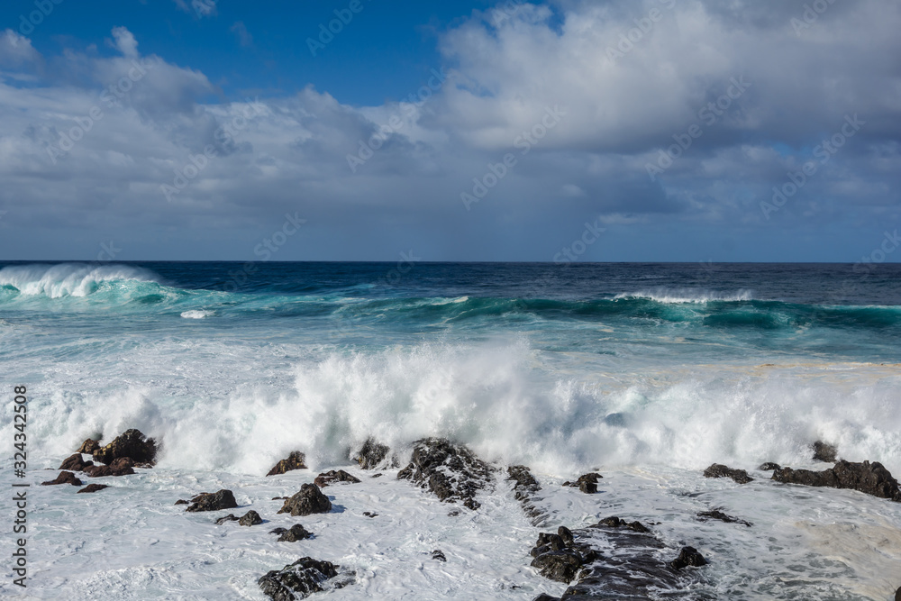 A powerful storm in the Atlantic Ocean in a bay on the coast of Tenerife. A powerful storm in the Atlantic Ocean in a bay on the coast of Tenerife.