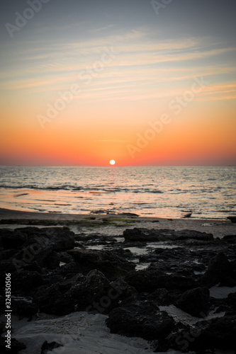 Sunset on a beach in Masirah Island  Oman