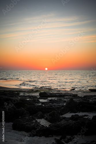 Sunset on a beach in Masirah Island, Oman © RG41_official