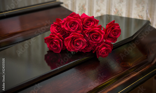 Wooden coffin of dark color. Funeral, burial. Death.