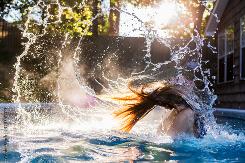 13 year old girl swimming in a pool