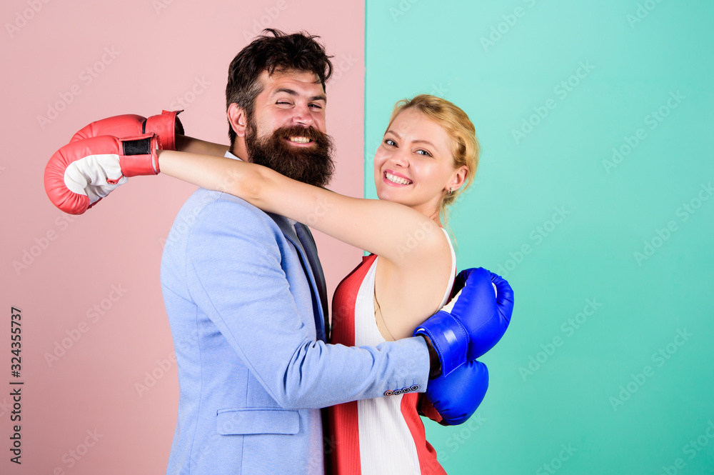 Complicated relationships. Couple romantic relationships. Difficult relationships. Couple in love competing boxing. Conflict concept. Family life. Boxers fighting gloves. Man and woman boxing fight Complicated relationships. Couple romantic relationships. Difficult relationships. Couple in love competing boxing. Conflict concept. Family life. Boxers fighting gloves. Man and woman boxing fight