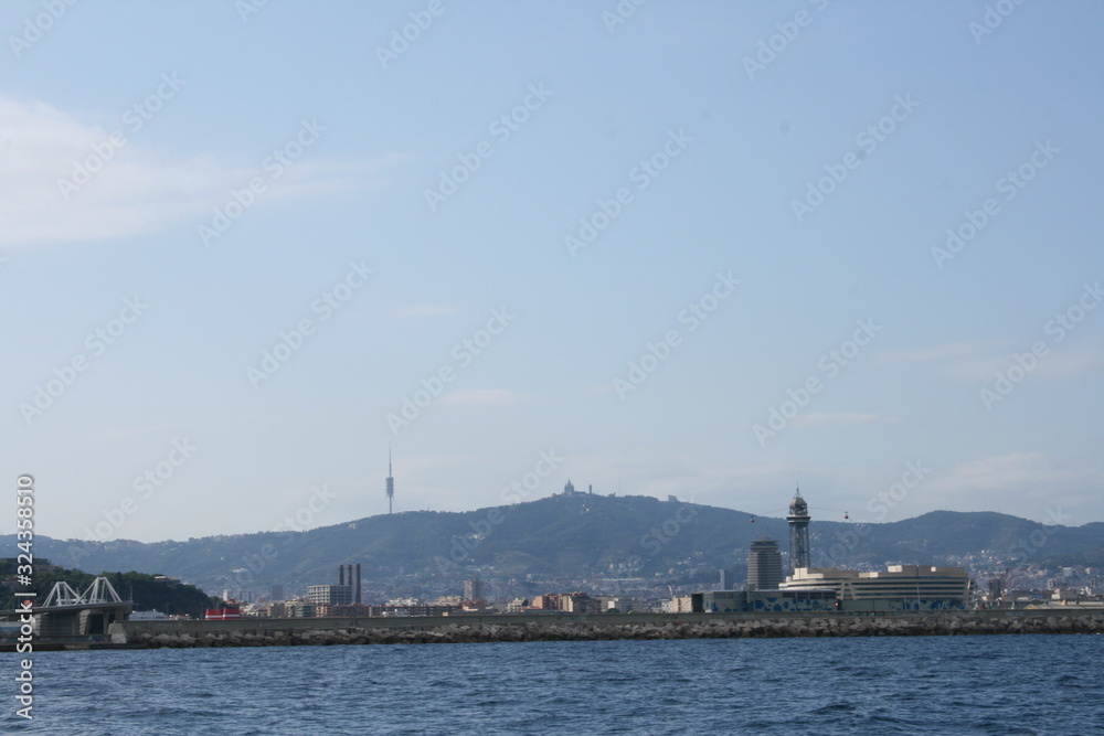 VIEW OF THE PORT OF BARCELONA AND SURROUNDINGS FROM A FERRY